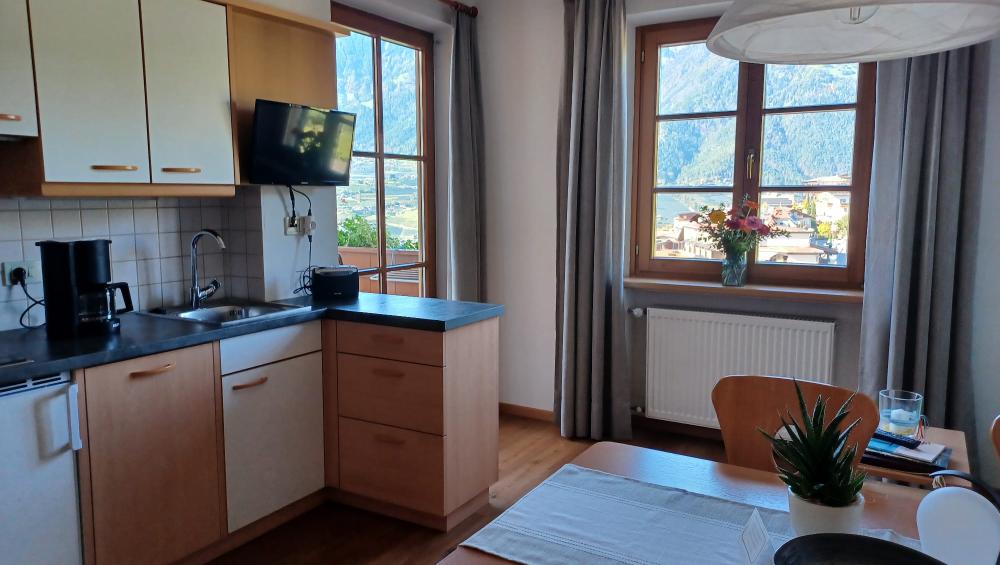Cucina con comoda seduta ad angolo Cucina con comoda seduta ad angolo